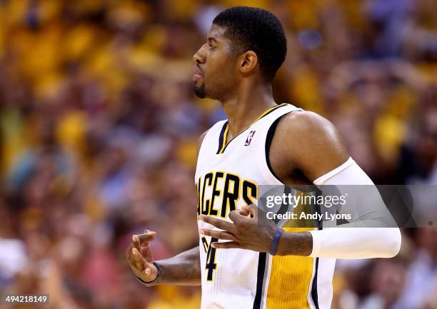 Paul George of the Indiana Pacers reacts against the Miami Heat during Game Five of the Eastern Conference Finals of the 2014 NBA Playoffs at Bankers...