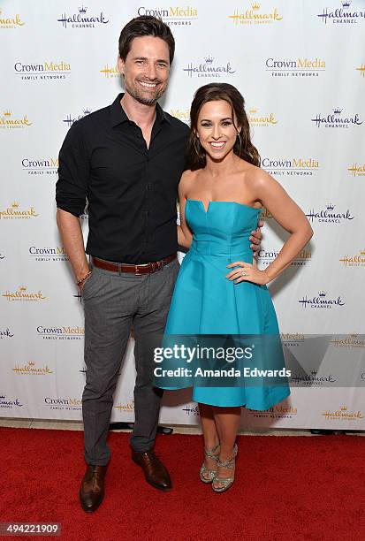 Actor Warren Christie and actress Lacey Chabert arrive at "The Color Of Rain" premiere screening presented by the Hallmark Movie Channel at The Paley...