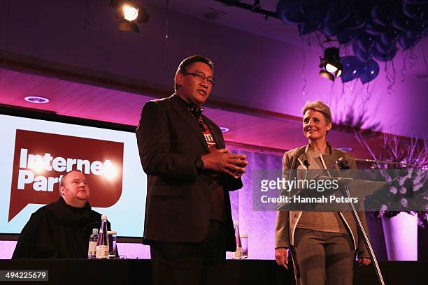 Mana Party leader Hone Harawira speaks with Laila Harre and Kim Dotcom during a press conference announcing former leader of the Alliance Party,...