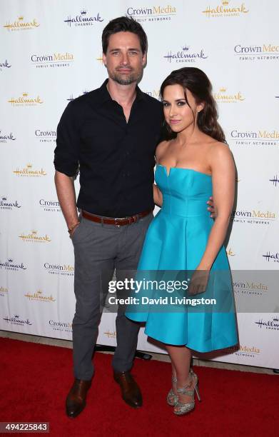 Actors Warren Christie and Lacey Chabert attend "The Color of Rain" premiere screening presented by the Hallmark Movie Channel at The Paley Center...