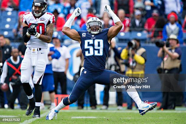 Wesley Woodyard of the Tennessee Titans celebrates in the first half after making a big tackle during a game against the Atlanta Falcons at Nissan...
