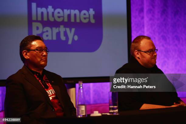 Mana Party leader Hone Harawira and Kim Dotcom listen as Laila Harre speaks during a press conference announcing former leader of the Alliance Party,...