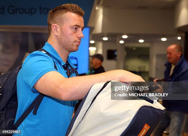 Joe Gray from the English rugby team arrives at Auckland International Airport in Auckland on May 29, 2014. England's rugby team is in New Zealand...