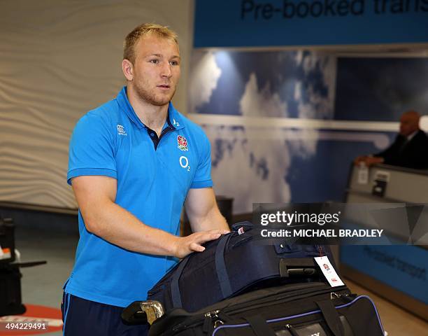 Matt Kvesic from the English rugby team arrives at Auckland International Airport in Auckland on May 29, 2014. England's rugby team is in New Zealand...