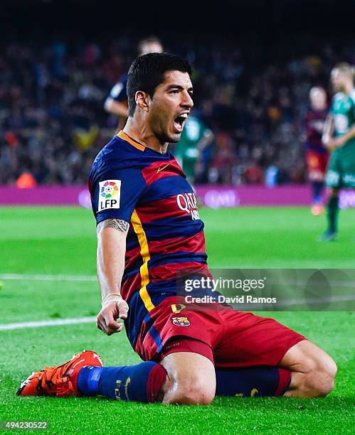 Luis Suarez of FC Barcelona celebrates after scoring his team's third goal during the La Liga match between FC Barcelona and SD Eibar at Camp Nou on...