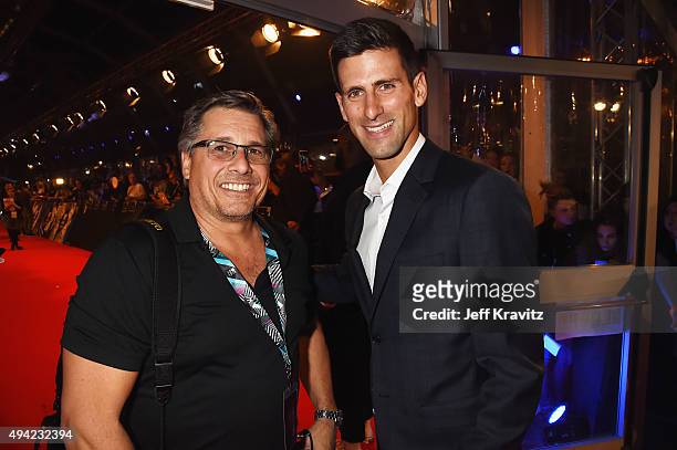 Tennis pro Novak Djokovic poses with photographer Kevin Mazur at the MTV EMA's 2015 at Mediolanum Forum on October 25, 2015 in Milan, Italy.