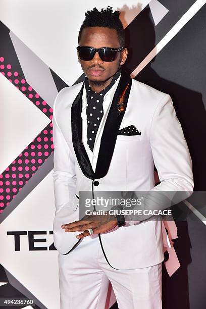 Diamond Platnumz poses on the red carpet of the 2015 MTV Europe Music Awards at Mediolanum Forum on October 25, 2015 in Milan. AFP PHOTO / GIUSEPPE...