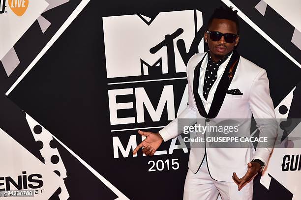 Diamond Platnumz poses on the red carpet of the 2015 MTV Europe Music Awards at Mediolanum Forum on October 25, 2015 in Milan. AFP PHOTO / GIUSEPPE...