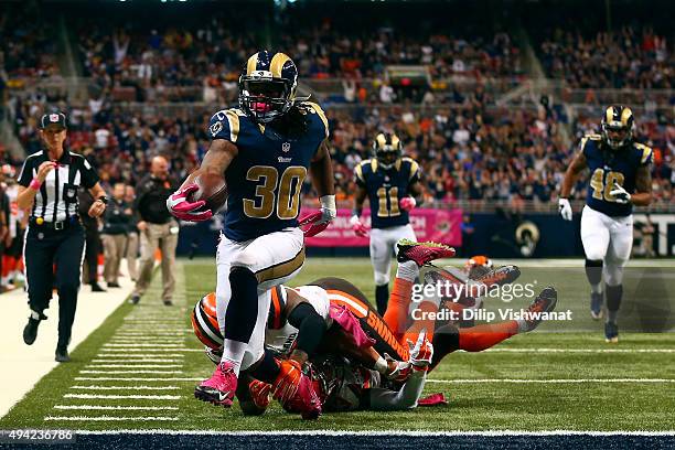 Todd Gurley of the St. Louis Rams scores a touchdown in the fourth quarter against the Cleveland Browns at the Edward Jones Dome on October 25, 2015...