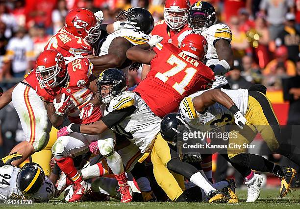 Kansas City Chiefs running back Charcandrick West seals the victory with a first down from the tackle of Pittsburgh Steelers inside linebacker Ryan...