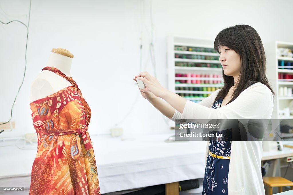 Woman taking photo with mobile