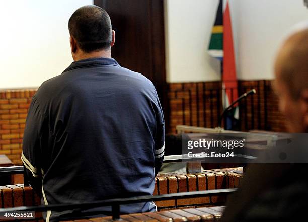 Hermanus Engelbrecht appears at the Springs Magistrate's court on May 28, 2014 in Springs, South Africa. The 36-year-old man was arrested for holding...