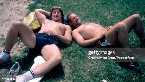 Tony Bond and Dusty Hare of the England rugby union team sunbathing during the England Tour of the United States and Canada, circa June 1982.