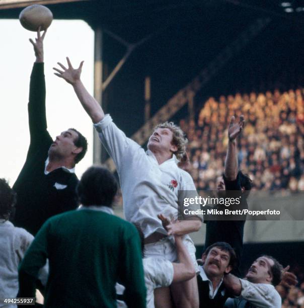 Andy Haden of the New Zealand All Blacks outjumps Maurice Colclough of England during the International match at Twickenham in London on 24th...