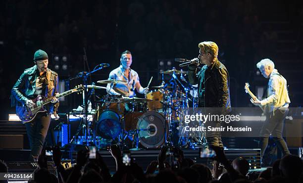 The Edge, Larry Mullen Jr, Bono and Adam Clayton of U2 perform at The O2 Arena as part of their iNNOCENCE + eXPERIENCE tour on October 25, 2015 in...