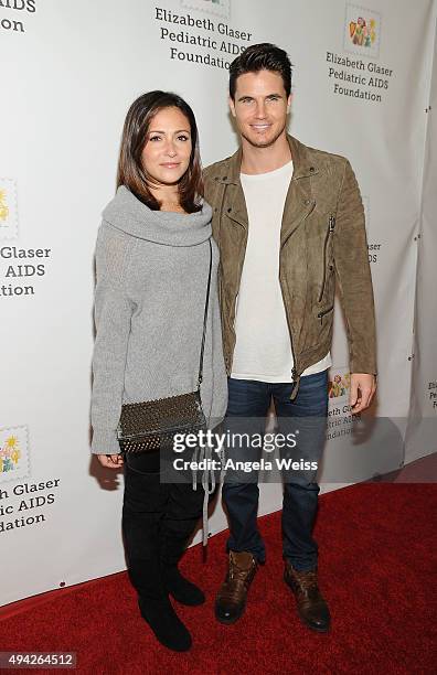 Actors Italia Ricci and Robbie Amell attend the Elizabeth Glaser Pediatric AIDS Foundation's 26th Annual A Time For Heroes Family Festival at...