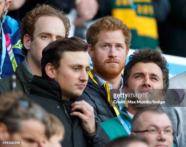 Tom Inskip, Charlie van Straubenzee, Prince Harry and Thomas van Straubenzee attend the 2015 Rugby World Cup Semi Final match between Argentina and...
