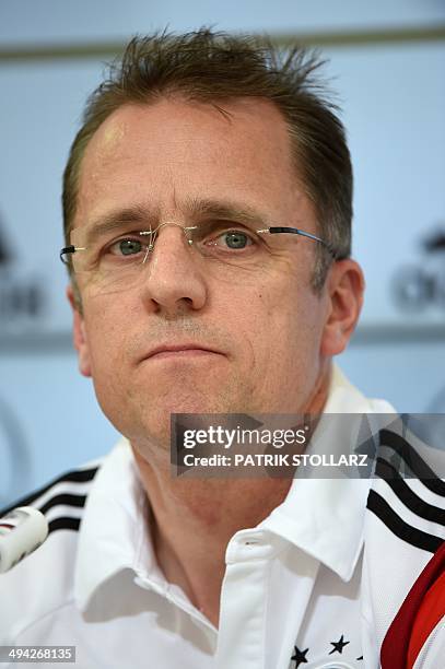 Germany's team doctor Tim Meyer answers questions during a press conference of the German national football team on a training ground in San Martino...