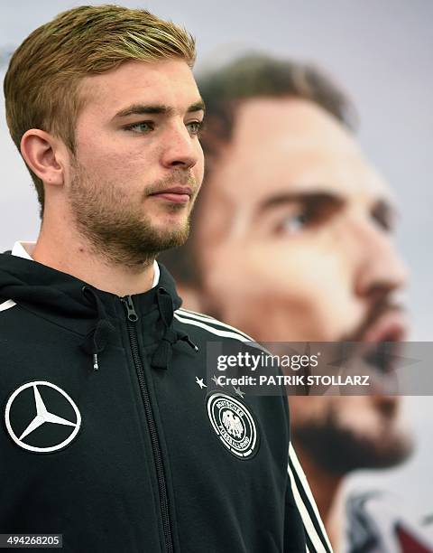 Germany's national football team midfielder Christoph Kramer looks on during a press conference on a training ground in San Martino in Passiria,...