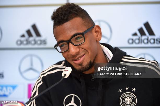 Germany's national football team defender Jerome Boateng takes part in a press conference on a training ground in San Martino in Passiria, Italy, on...