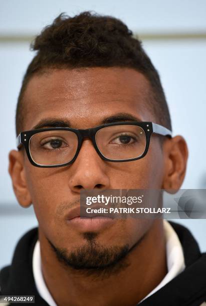 Germany's national football team defender Jerome Boateng takes part in a press conference on a training ground in San Martino in Passiria, Italy, on...