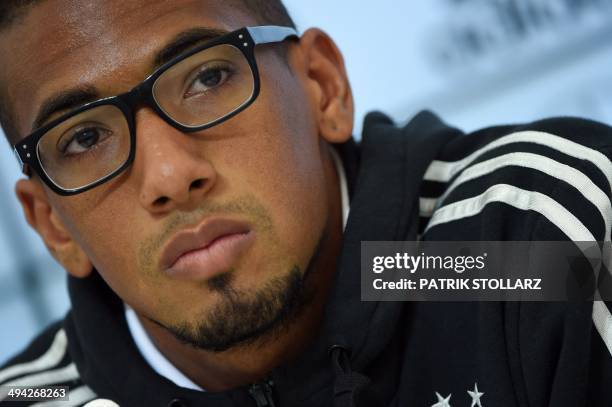 Germany's national football team defender Jerome Boateng takes part in a press conference on a training ground in San Martino in Passiria, Italy, on...