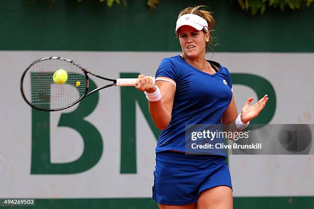 Maria Teresa Torro Flor of Spain returns a shot during her women's singles match against Magdalena Rybarikova of Slovakia on day five of the French...