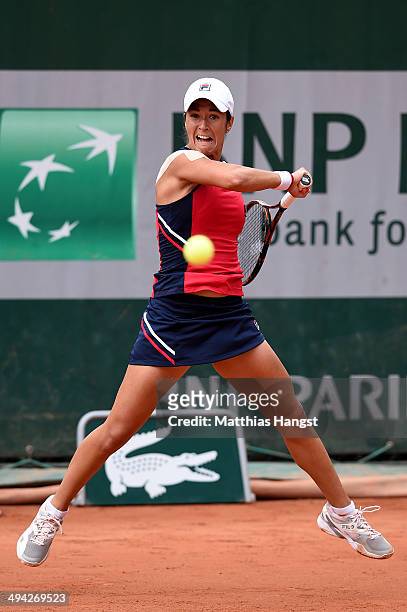 Silvia Soler Espinosa of Spain returns a shot during her women's singles match against Yanina Wickmayer of Belgium on day five of the French Open at...