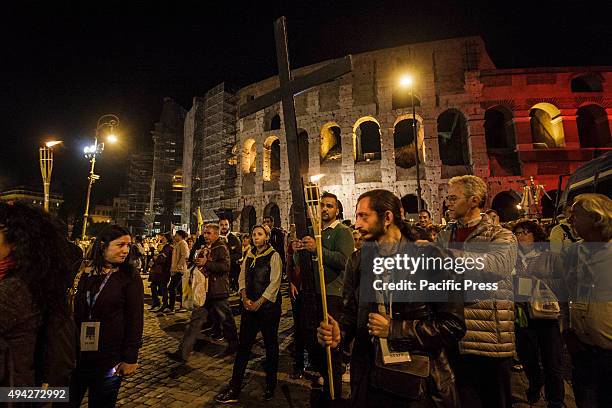 Thousands of Gypsies attend celebrations of the Via Crucis outside the Colosseum in Rome, to mark the 50th anniversary of the historic visit of Pope...