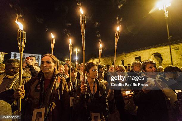 Thousands of Gypsies attend celebrations of the Via Crucis outside the Colosseum in Rome, to mark the 50th anniversary of the historic visit of Pope...