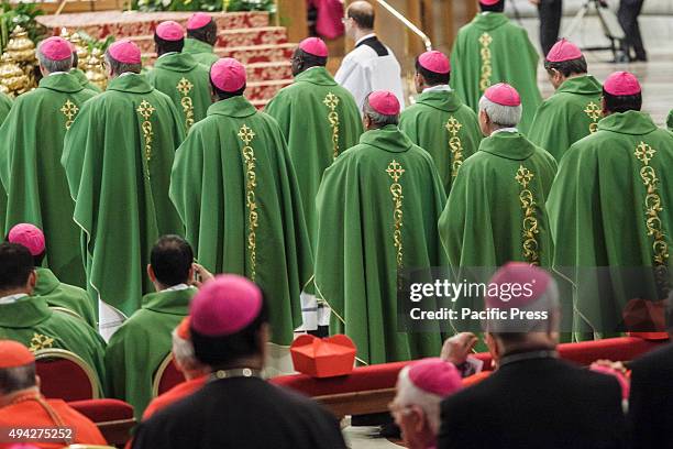 Bishops take part in a Holy Mass for the 14th Ordinary General Assembly of the Synod of Bishops at St Peter's Basilica in Vatican. Pope Francis mark...