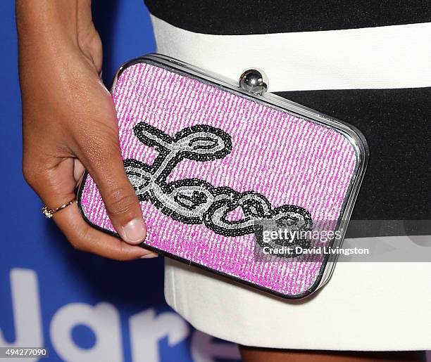 Actress Chandler Kinney, purse detail, attends the Just Jared Fall Fun Day at a private residence on October 24, 2015 in Los Angeles, California.