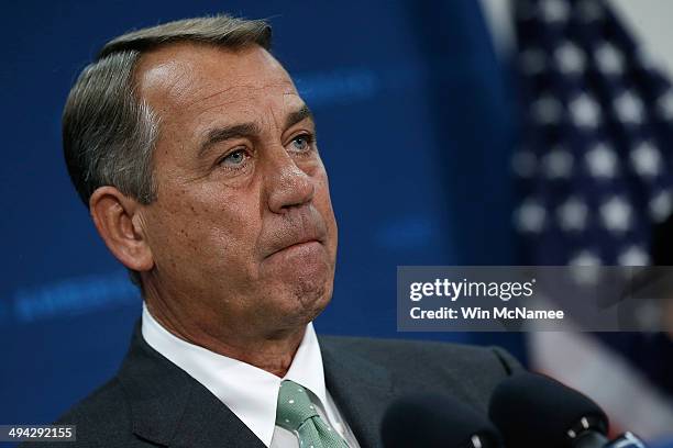 Speaker of the House John Boehner answers questions during a press conference following a meeting of the House Republican Conference at the U.S....