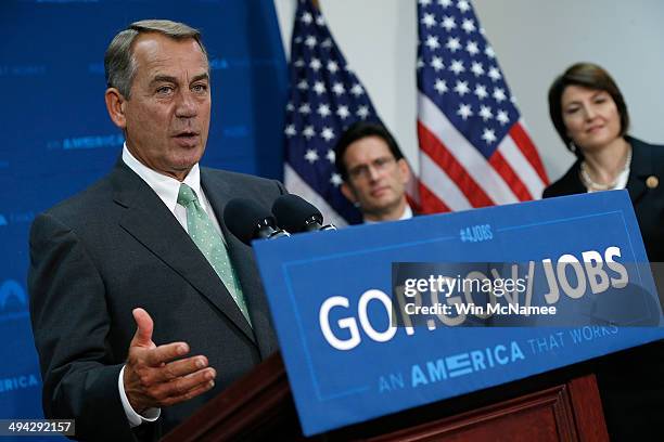 Speaker of the House John Boehner answers questions during a press conference following a meeting of the House Republican Conference at the U.S....