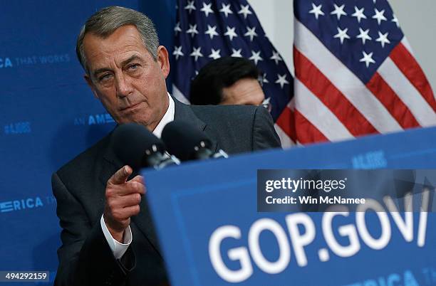 Speaker of the House John Boehner answers questions during a press conference following a meeting of the House Republican Conference at the U.S....