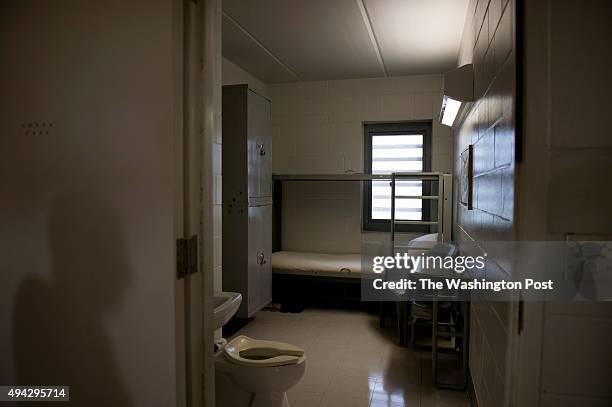 The 8X13 dimensions of a sparse prison cell houses 2 inmates at FCI Coleman Medium - Federal Bureau of Prisons, in Coleman, Florida, on Monday, April...