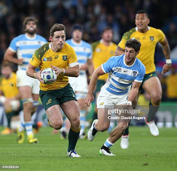 Bernard Foley of Australia breaks with the ball during the 2015 Rugby World Cup Semi Final match between Argentina and Australia at Twickenham...