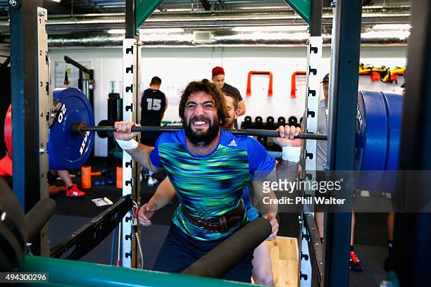 Samuel Whitelock of the All Blacks squats during a New Zealand All Blacks training session at London Irish on October 26, 2015 in Bagshot, United...