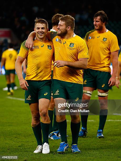 Drew Mitchell of Australia and James Slipper of Australia celebrate after winning the 2015 Rugby World Cup Semi Final match between Argentina and...