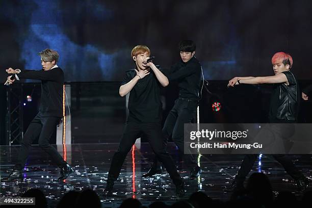 Members of boy band Infinite perform onstage during the MBC Music 'Show Champion' on May 28, 2014 in Seoul, South Korea.