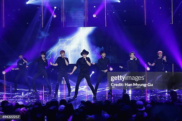 Members of boy band Infinite perform onstage during the MBC Music 'Show Champion' on May 28, 2014 in Seoul, South Korea.