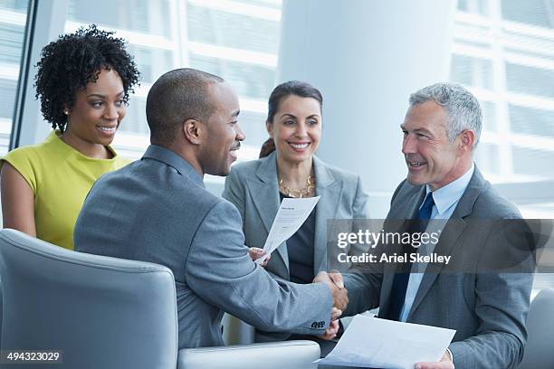 business people talking in meeting - social contract stockfoto's en -beelden