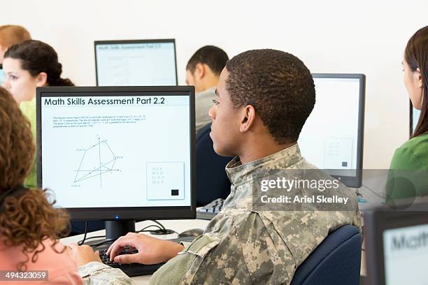 students taking test in class - college admission stock pictures, royalty-free photos & images
