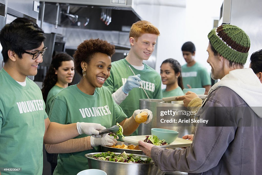 Volunteers working in soup kitchen