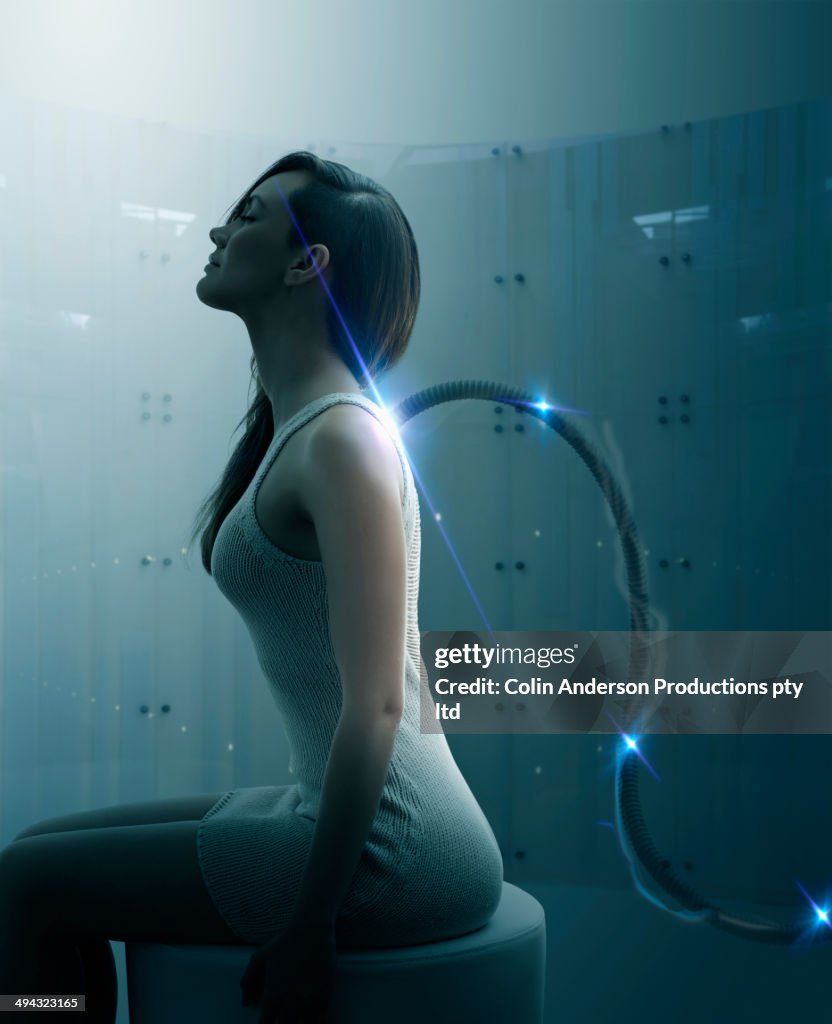 Mixed race woman being recharged
