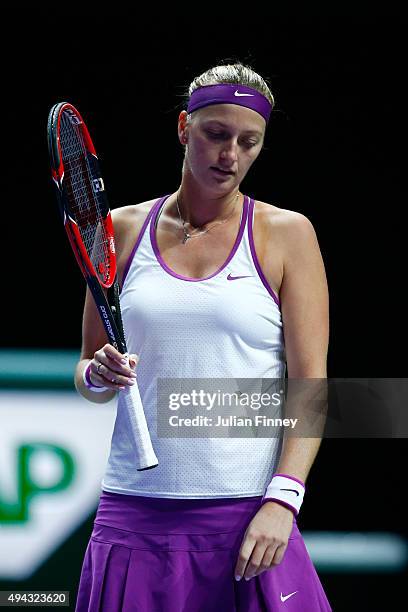 Petra Kvitova of Czech Republic reacts during her round robin match against Angelique Kerber of Germany during the BNP Paribas WTA Finals at...