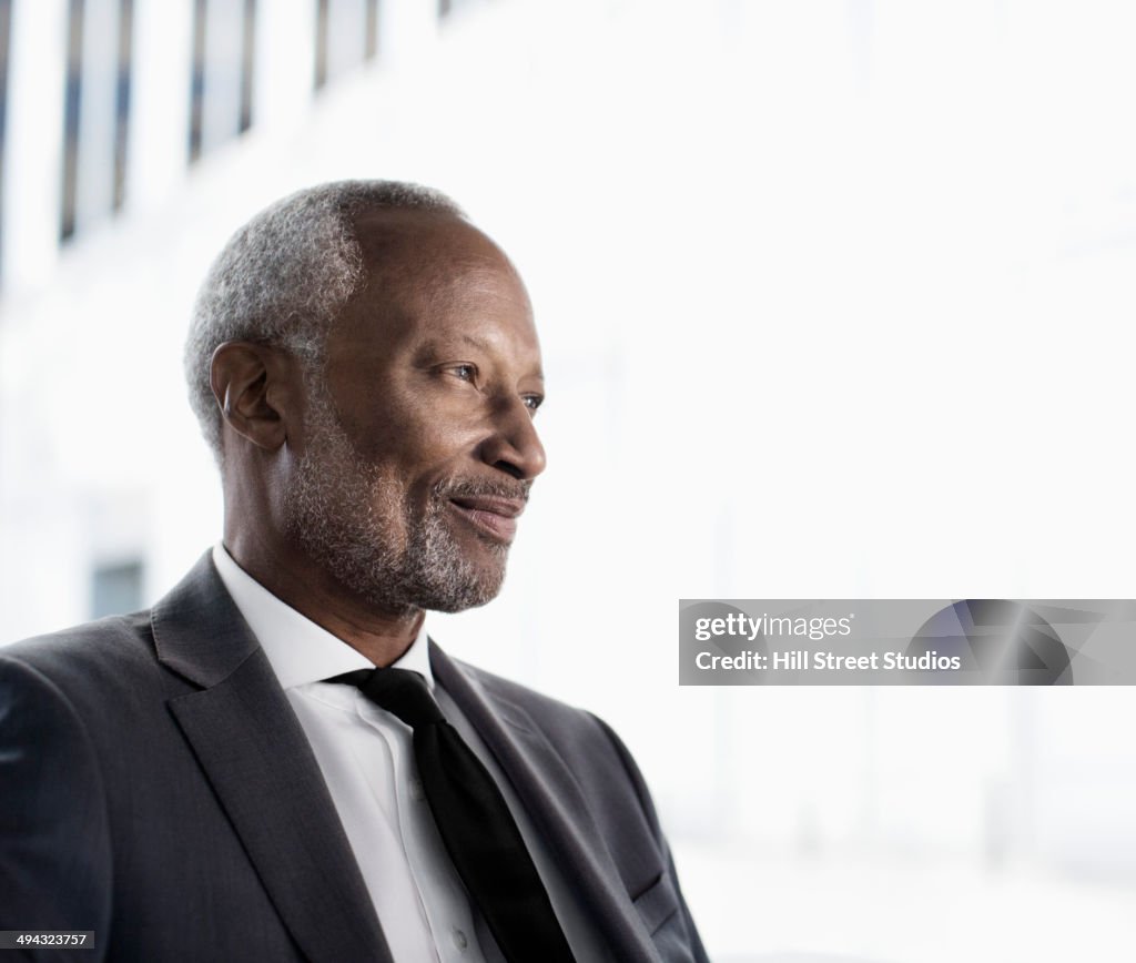 Black businessman sitting in office