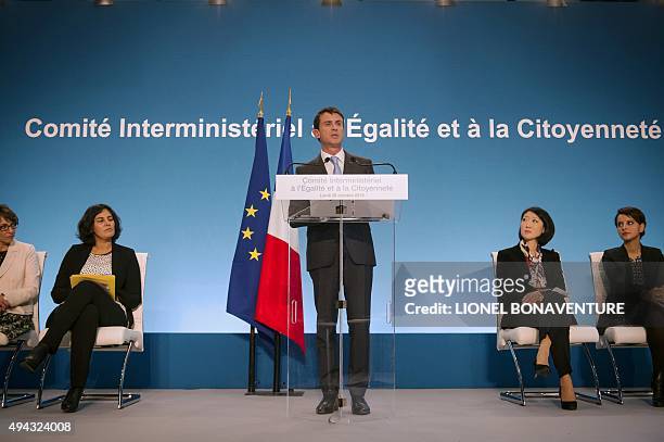France's Prime Minister Manuel Valls delivers a speech during a visit to the Vigne Blanche district in Les Mureaux on October 26, 2015. French Labour...