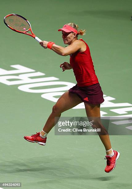 Angelique Kerber of Germany in action against Petra Kvitova of Czech Republic in a round robin match during the BNP Paribas WTA Finals at Singapore...