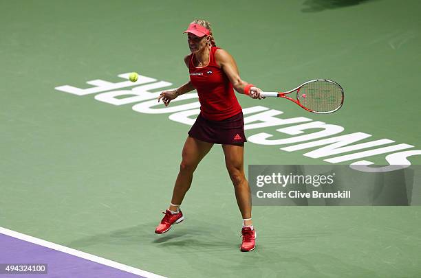 Angelique Kerber of Germany in action against Petra Kvitova of Czech Republic in a round robin match during the BNP Paribas WTA Finals at Singapore...